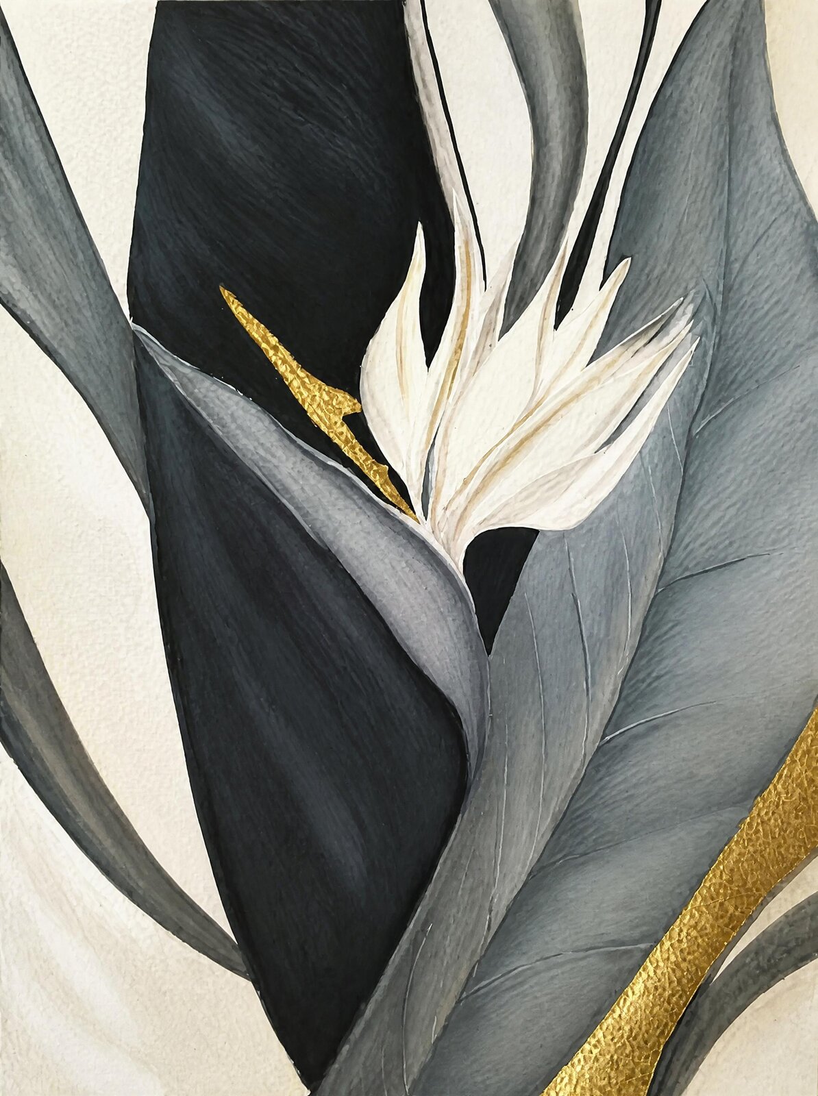 A white bird of paradise flower among grey, silky leaves, crossed by a seam of gold leaf.