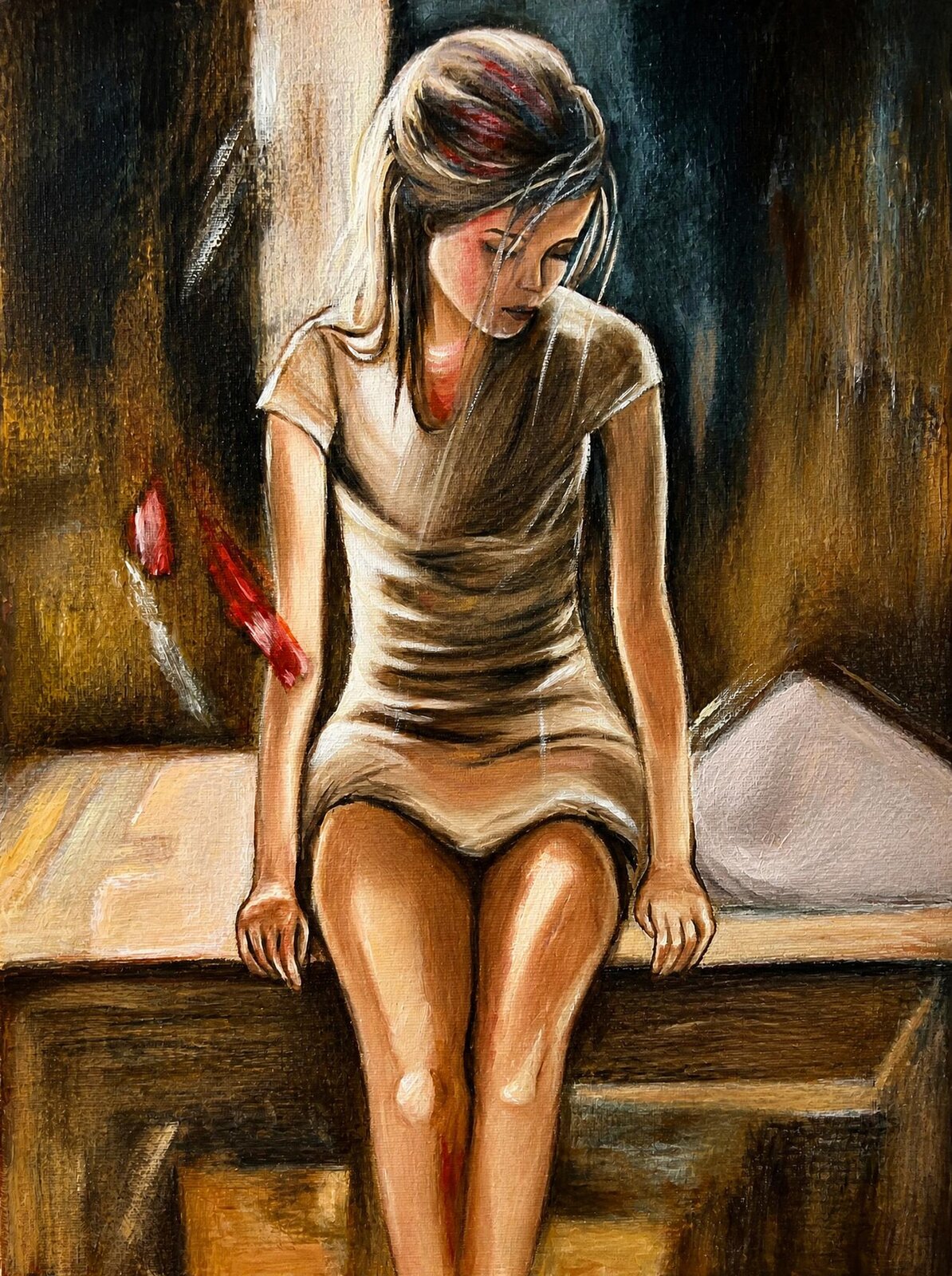 A young woman with a streak of red in her hair sits at the edge of a bed, looking down.